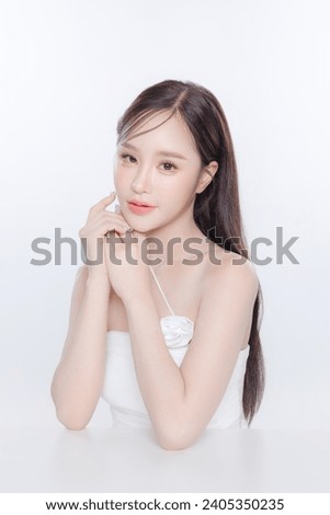 Young Asian woman long hair with clean fresh skin Korean makeup on white background, Female model Face care, Facial treatment, Cosmetology, beauty and spa, Asian women portrait. Royalty-Free Stock Photo #2405350235