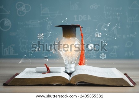 Graduation cap with a lightbulb on the book and icon learning in the classroom. Education learning concepts in school or university. Idea knowledge of innovative technology, science, and mathematics. Royalty-Free Stock Photo #2405355581