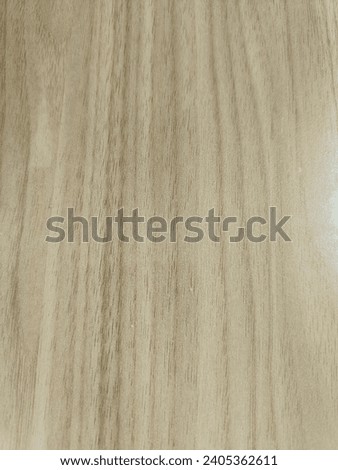 The picture depicts a beautiful background with wooden motifs. Wood fiber details and natural colors create a beautiful and warm look, giving a touch of naturalness and beauty to the image.