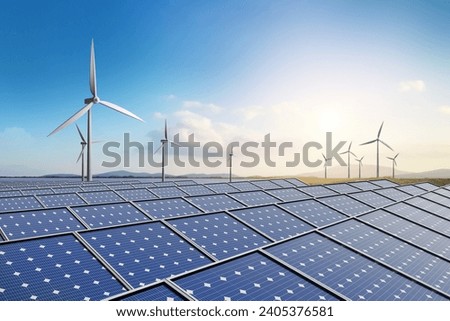 Clean energy, Solar farm and wind turbine with beautiful blue sky background. Royalty-Free Stock Photo #2405376581