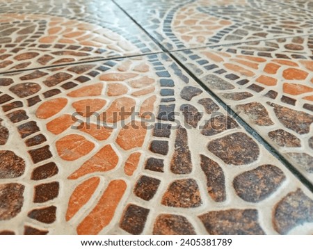 Texture and detail of a ceramic tile floor constructed with cement and stone motifs, concrete marble material for home design and improvement