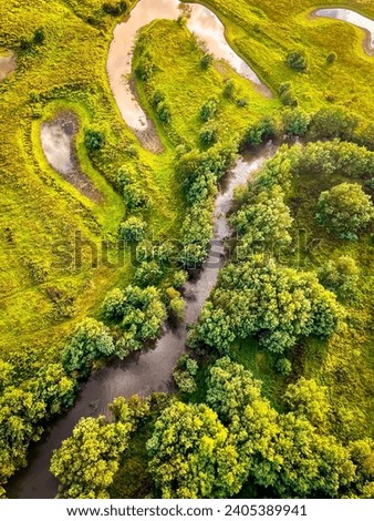 Aerial view, curves of river landscape in the Yarra Valley, Melbourne, Australia. Air ballooning adventure. Sunrise at Yarra Valley Royalty-Free Stock Photo #2405389941