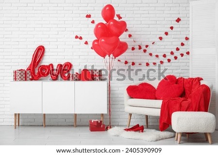 Interior of festive living room with decorations for Valentine's Day celebration Royalty-Free Stock Photo #2405390909