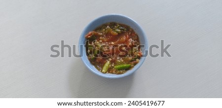 a call of this chilli sauce is 'Sambal Acan'.
a place at bowl, very very hot and delicious Royalty-Free Stock Photo #2405419677