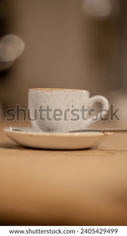 esspresso cups in detail on a wodden table Royalty-Free Stock Photo #2405429499