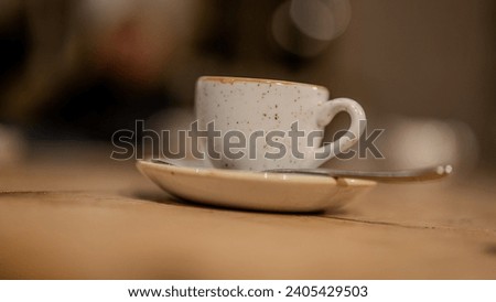 esspresso cups in detail on a wodden table Royalty-Free Stock Photo #2405429503