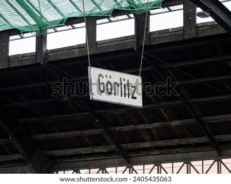 Görlitz location sign hanging from the ceiling in an old building. Location signage of a travel destination in Saxony. City in East Germany next to the border to Poland.