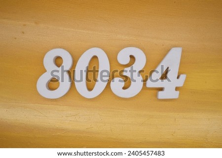 The golden yellow painted wood panel for the background, number 8034, is made from white painted wood.