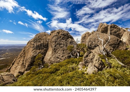 Landscape views at the summit of Porcupine Rocks on the Porcupine Walking Track on a summer's day in Kosciuszko National Park, Snowy Mountains, New South Wales, Australia