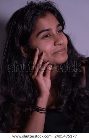 multiple expressions of face in a portrait photo of a Indian woman in the indoor theme