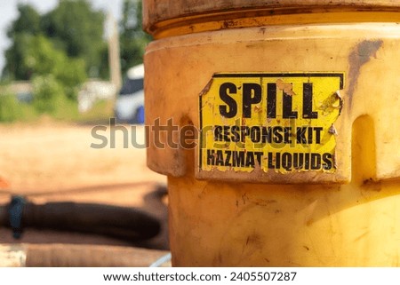 The spill kit container box, using to keep the equipment that using for cleaning the chemical or oil spilling at the factory area. Emergency sign and symbol in industrial. Close-up.