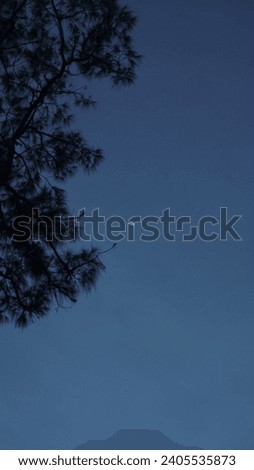 Maghrib Majesty: The Radiance of Dusk in the Evening Sky Royalty-Free Stock Photo #2405535873