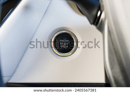 Close up engine car start button. Start stop engine modern new car button,Makes it easy to turn your auto mobile on and off. a key fob unique ,selecti