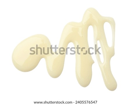 Spilled tasty condensed milk isolated on white, top view Royalty-Free Stock Photo #2405576547
