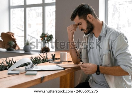 Sad tired exhausted caucasian professional coworker user manager businessman having problem issue, being fired, loan and debt, stressed and overworked, failed on work place job Royalty-Free Stock Photo #2405595295