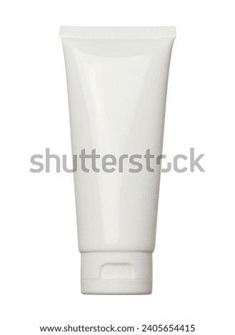 White plastic tube for cream, gel and toothpaste on an isolated background Royalty-Free Stock Photo #2405654415