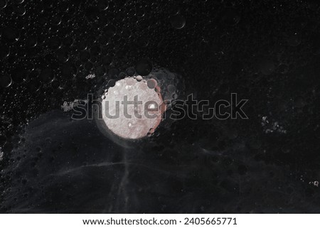 Close up of tablets medicine dissolve in water contain oil