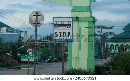 Bus Stop Sign on post pole, traffic road roadsign