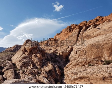 Red Rock Canyon State Park, Golden Sun light on rock at Red Rock Canyon, USA, with blue sky and white clouds, Red rock canyon of mountain view