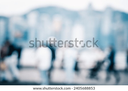 Blurred image of people enjoying the view of harbour hong kong