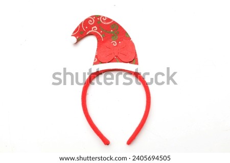 cute Christmas headbands with christmas 
red santa claus hat isolate on a white backdrop. concept of joyful Christmas party,New year is coming soon, festive season decoration with Christmas elements