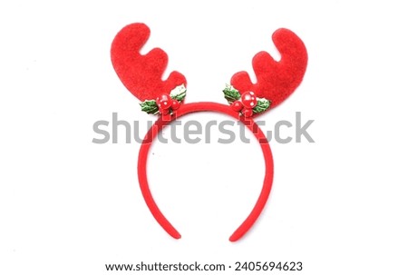 cute christmas headbands with funny red deer horns isolate on a white backdrop. concept of joyful christmas party,new year is coming soon, festive season decoration with christmas elements
