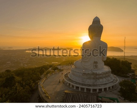 
Aerial view scenery yellow sunrise in front of Phuket Big Buddha
the beautiful golden sun at the horizon.
The beauty of the statue fits perfectly with the charming nature. 