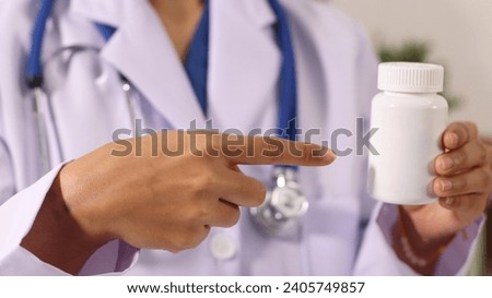Initial AI illustration of a close-up of a female doctor's hand signing a medical document on a clipboard. and recommending certain medicines to patients on a laptop