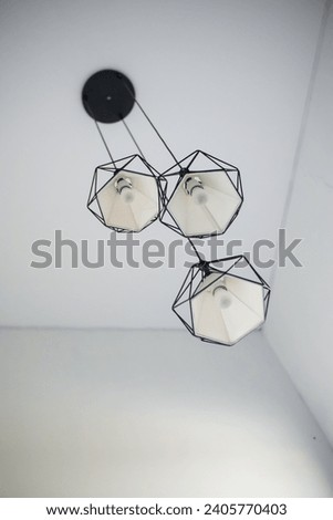 Hanging light bulbs and lamps in the style of a modern coffee shop as interiors in the house