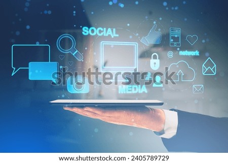 Close up of businessman hand holding cellphone with creative social media interface with emails, speech bubbles, mobile internet, computing and other icons on blurry office background. Double exposure