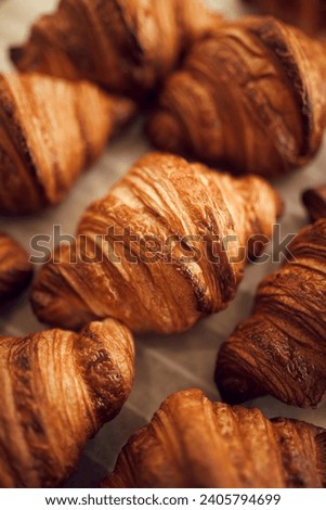 French breakfast. Top. View. Close up photo of tray of freshly baked pastries, flavorful, warm, crispy croissants. Bakery recipes. Concept of food, bakery, cuisine, desserts, cooking and nutrition. Royalty-Free Stock Photo #2405794699