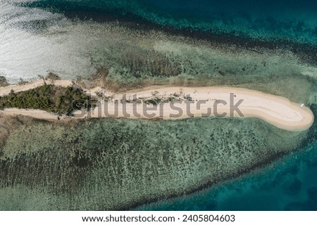 Aerial view of the sand spit of the paradise island of Maltatayoc, Calamianes, Philippines.