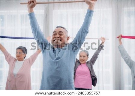 Senior lifestyle at home. Older adults exercise at their houses. Senior exercising at a convalescent facility.  Royalty-Free Stock Photo #2405855757