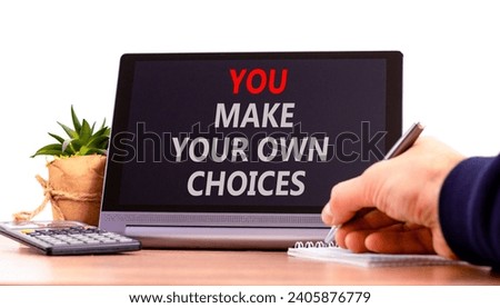 You make your own choice symbol. Concept words You make your own choice on beautiful black tablet. Beautiful white background. Businessman hand. Business you make your own choice concept. Copy space.
