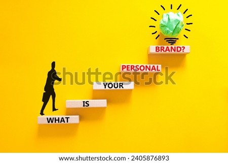 What is your personal brand symbol. Concept words What is your personal brand on wooden blocks. Beautiful yellow background. Businessman icon. Business what is your personal brand concept. Copy space.