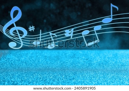 Music notes on dark background over glitter, bokeh effect