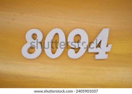 The golden yellow painted wood panel for the background, number 8094, is made from white painted wood.