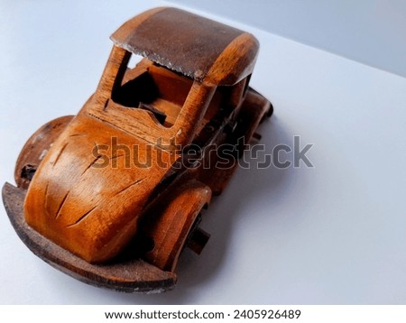A toy car made of wood
