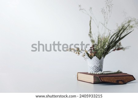 koran book flowers vase . Resolution and high quality beautiful photo