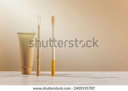 A image of toothbrushes cream container