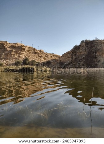A beautiful lake view at Wadi Namar Riyadh with Ducks swimming in it
