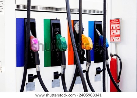White fuel dispenser for diesel, 91 gasoline, and 95 gasoline.