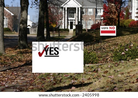 Neighborhood with election signs. These are yes and no that have been cleaned up for your own text. Shows opposition.