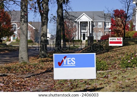 Neighborhood with election signs. These are yes and no that have been cleaned up for your own text. Shows opposition.