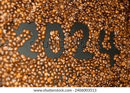 Pictures of coffee beans made textured with happy new year 2024 concept.
