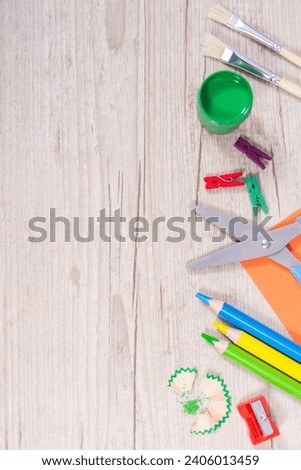 Stationery accessories used for learning at school or preschool. Development of creativity, logical thinking, coordination and kids motor skills. Copy space for text or inscription Royalty-Free Stock Photo #2406013459