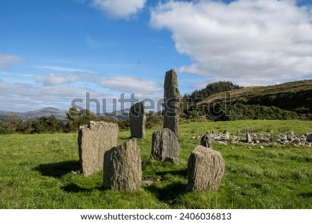 Kealkill stone circle is a Bronze Age five-stone circle located just outside the village of Kealkill, County Cork in southwest Ireland. Royalty-Free Stock Photo #2406036813