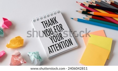 Creative concept Thank You For Your Attention text on notebook on white background. Royalty-Free Stock Photo #2406042811