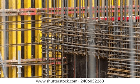 Monolithic construction, reinforcement mesh close-up, construction concept.