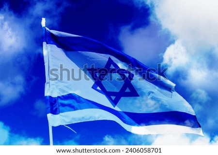 Israel. Flag of Israel against a background of blue sky with white clouds. Photo for Israel Independence Day